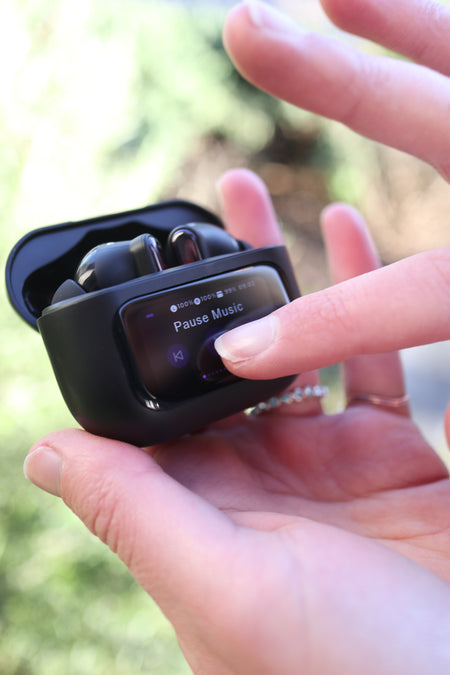 Touch screen earbuds in charging case 
